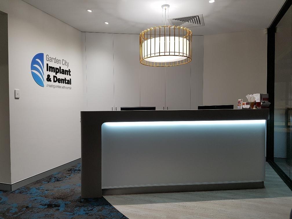 Clinic reception  Reception Desk at Garden City Implant & Dental